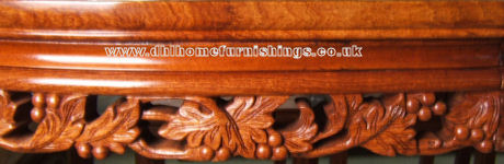 Example of rosewood table edge grape design